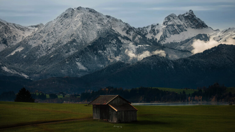 Fotografie Füssen Berge mit kleiner Hütte